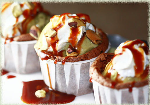 Sunken, Crackle-Top Mocha Cupcakes with Toasted Pistachio Gelato and Burnt Caramel Drizzle
